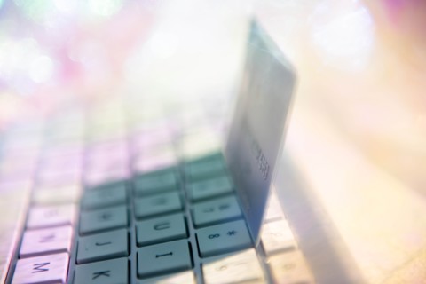 Credit card on computer keyboard