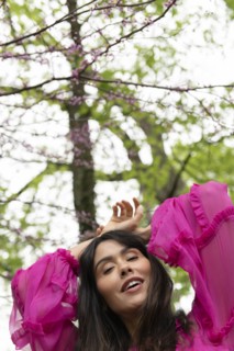 Woman under trees