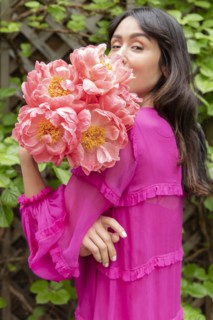 Woman holding bouquet of flowers