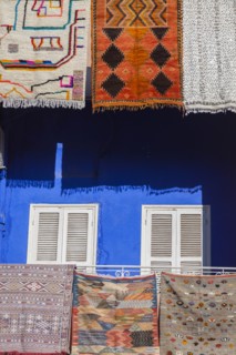 Rugs hanging from balconies in Marrakesh, Morocco