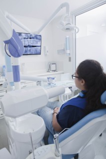 Teenage girl in dentist's chair