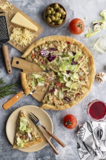 Pizza topped with cabbage