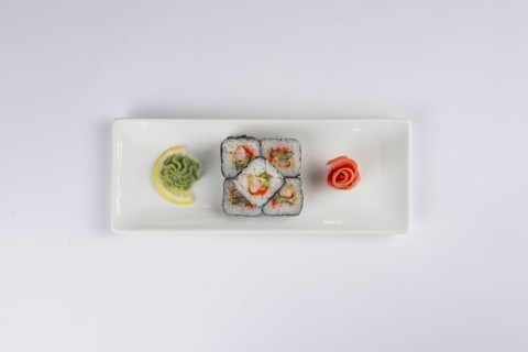 Plate of sushi with pickled ginger and wasabi