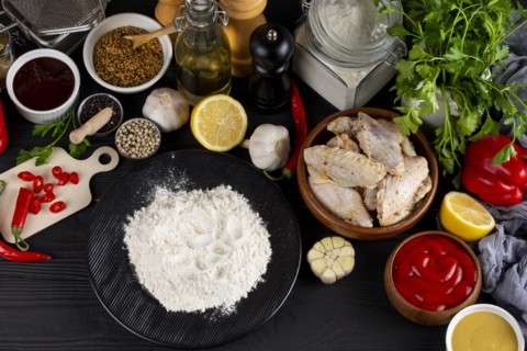 Raw ingredients including vegetables and flour