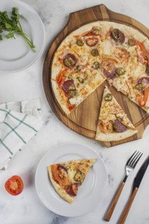 Sliced pizza with jalapenos