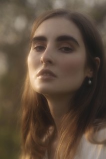 Portrait of young woman in sunlight