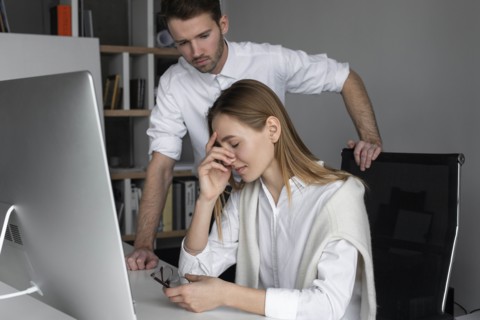 Upset businesswoman and sympathetic colleague
