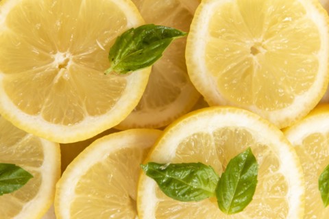 Sliced lemon with basil