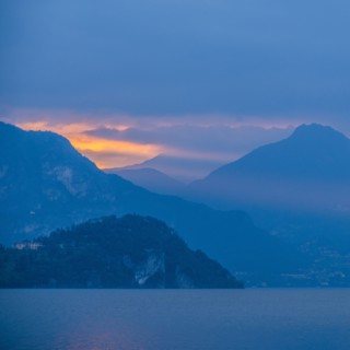 Sunset sky over mountains by Lake Como, Italy