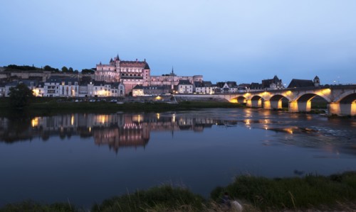 Amboise town by river at sunset in Loire Valley, France