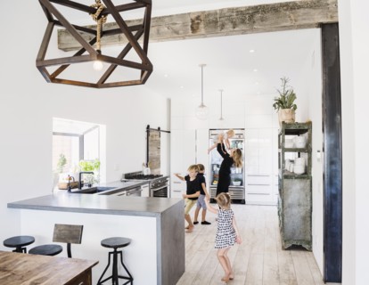 Mother and children in kitchen
