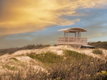 Lifeguard hut at sunset