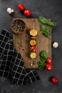 Grilled mushroom and courgette skewer on cutting board