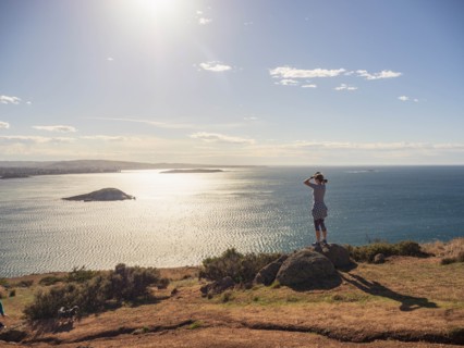 Woman looking at view of Victor Harbor, South Australia, Australia