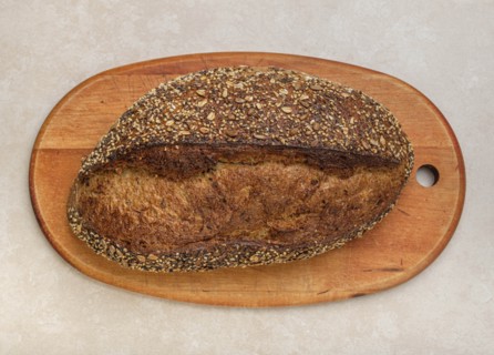 Loaf of bread on cutting board