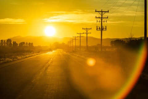 Sunset over country road in Picabo, Idaho, USA