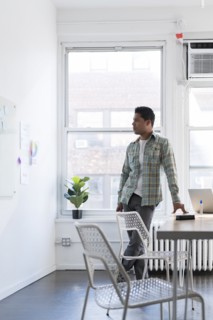 Businessman looking at whiteboard