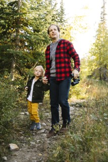 Father and son in forest