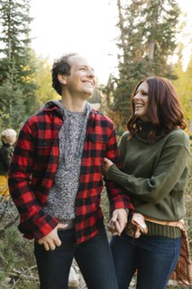 Couple smiling in forest