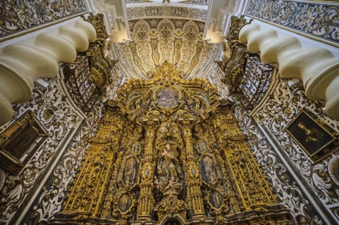 Ornate alter in Church of Saint Louis of France in Seville, Andalusia, Spain