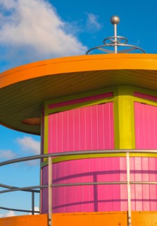 Pink and orange beach hut against sky in Miami, Florida, USA