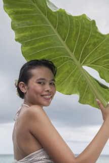 Woman holding big leaf