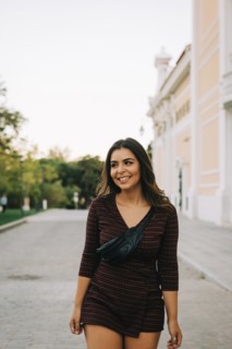Smiling woman on footpath