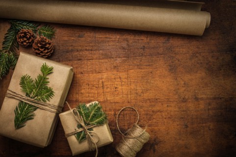 Pine fronds tied to Christmas presents