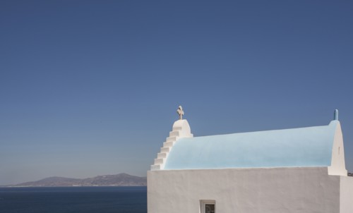 Roof of church by sea in Santorini, Greece