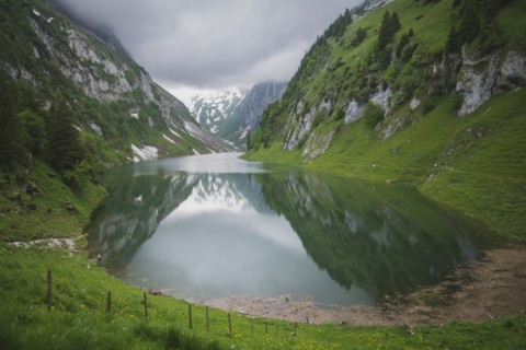 Lake in valley in Appenzell, Switzerland