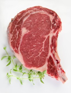 Raw steak and oregano