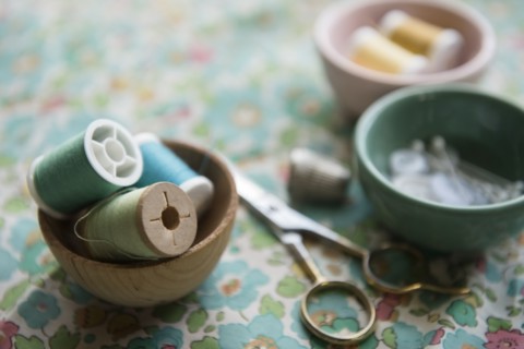 Spools of thread in bowl