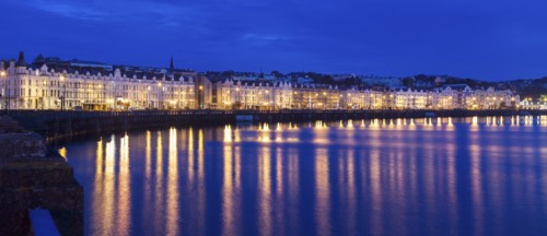 Buildings at night along waterfront of Douglas, Isle of Man