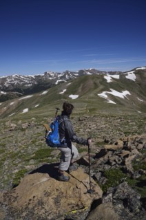 Woman looking at view while hiking in Loveland Pass, Colorado
