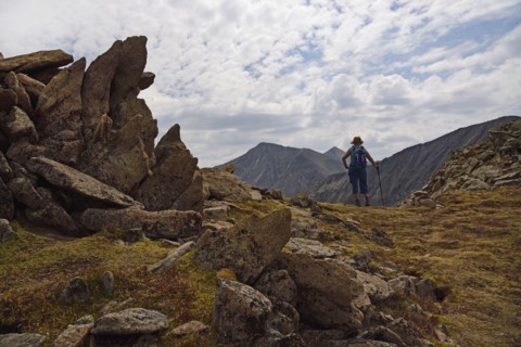 Woman looking at view while hiking in Loveland Pass, Colorado