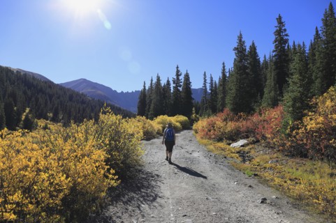 Woman hiking at Mayflower Gulch in Colorado