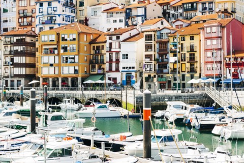 Moored boats and buildings on the waterfront of Bermeo, Spain