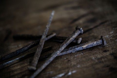 Nails on wooden table