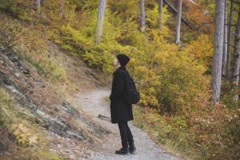 young woman in autumn forest