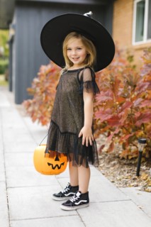 Girl in witch costume for Halloween