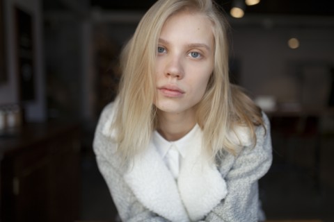 young woman in wool coat