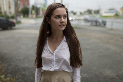young woman in parking lot