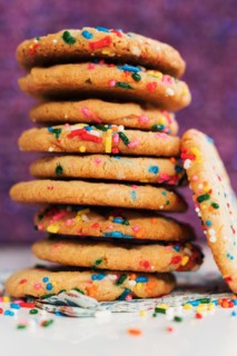 Pile of homemade cookies with colorful sprinkle
