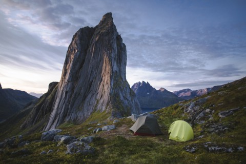 Norway, Senja, Two tents near Segla mountain at sunset
