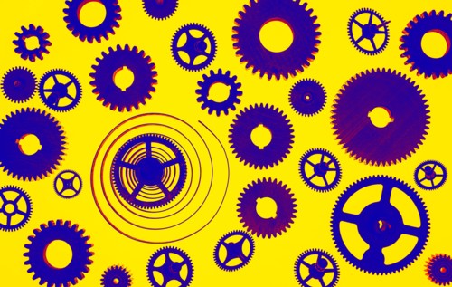 Illustration of cogs on yellow background