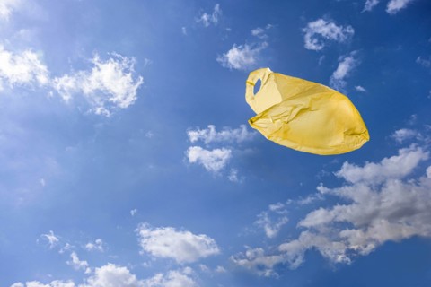 Yellow plastic bag in sky