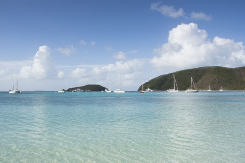 Boats in sea at Maho Bay in St. John, Virgin Islands