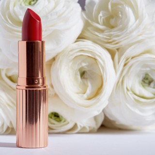 Red lipstick and white roses