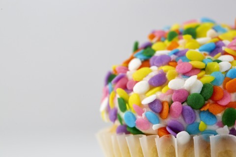 Cupcake with colorful sprinkles