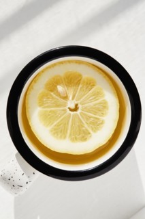 Lemon slice in cup of tea